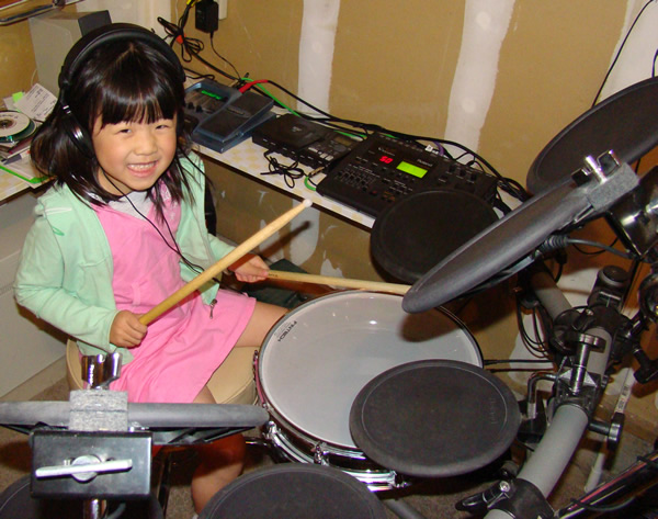 Faye on the Drums